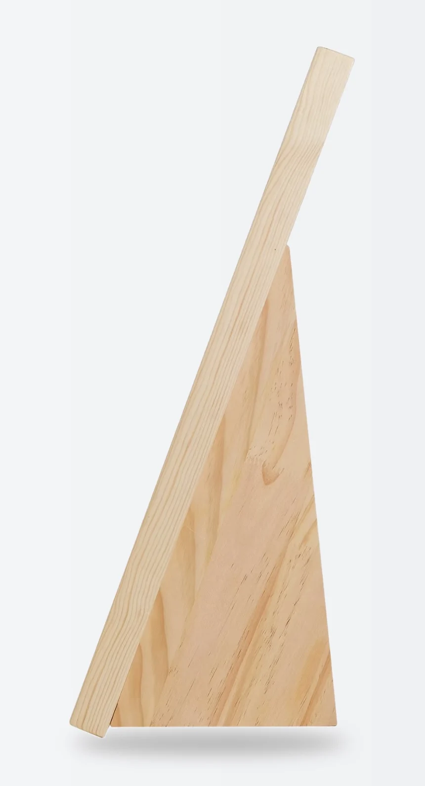 Side profile of the scratcher: a thick pine rail leaning on its wedge base at 70 degrees